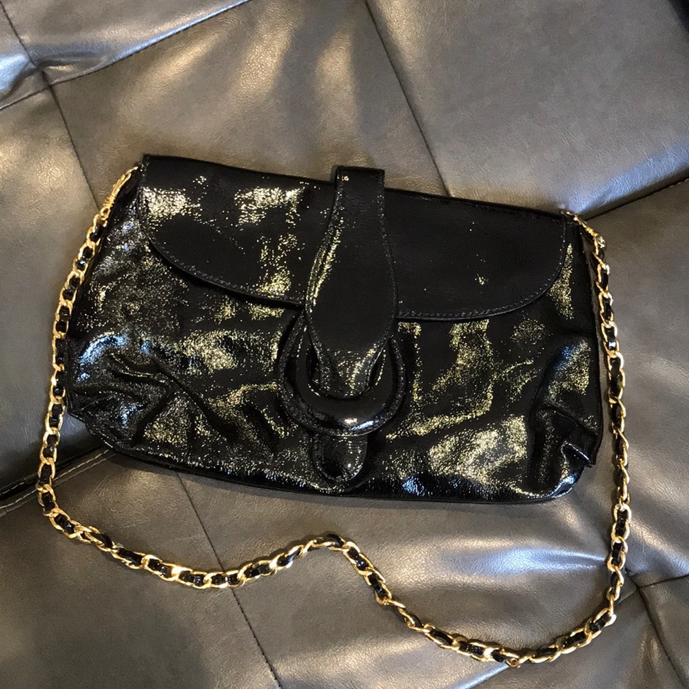 Black, genuine leather event bag.